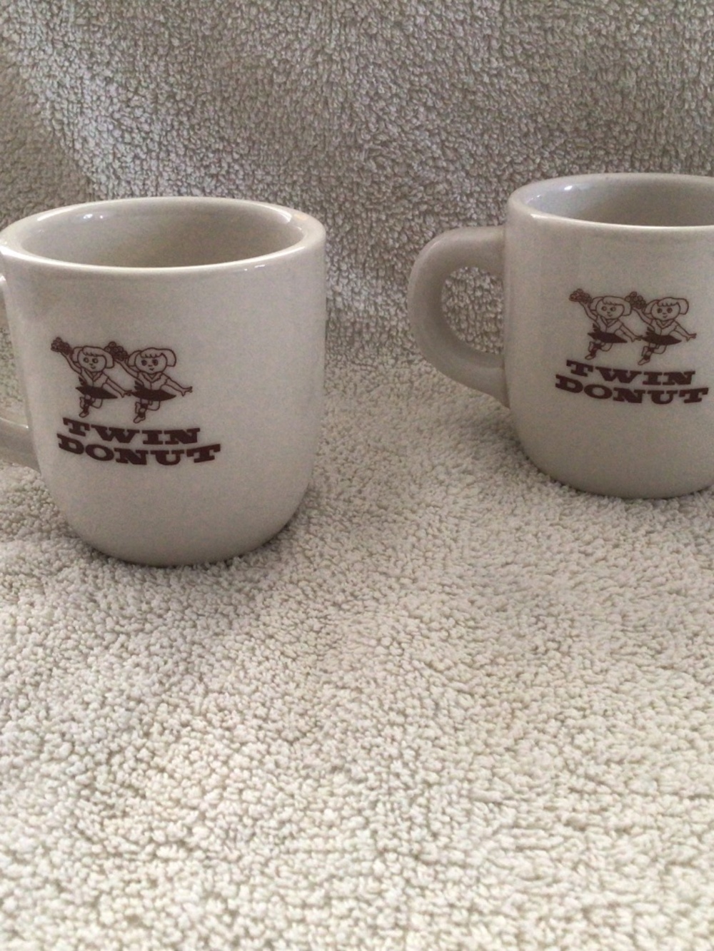 Set of 2 vintage “twin donut” ceramic coffee mugs
